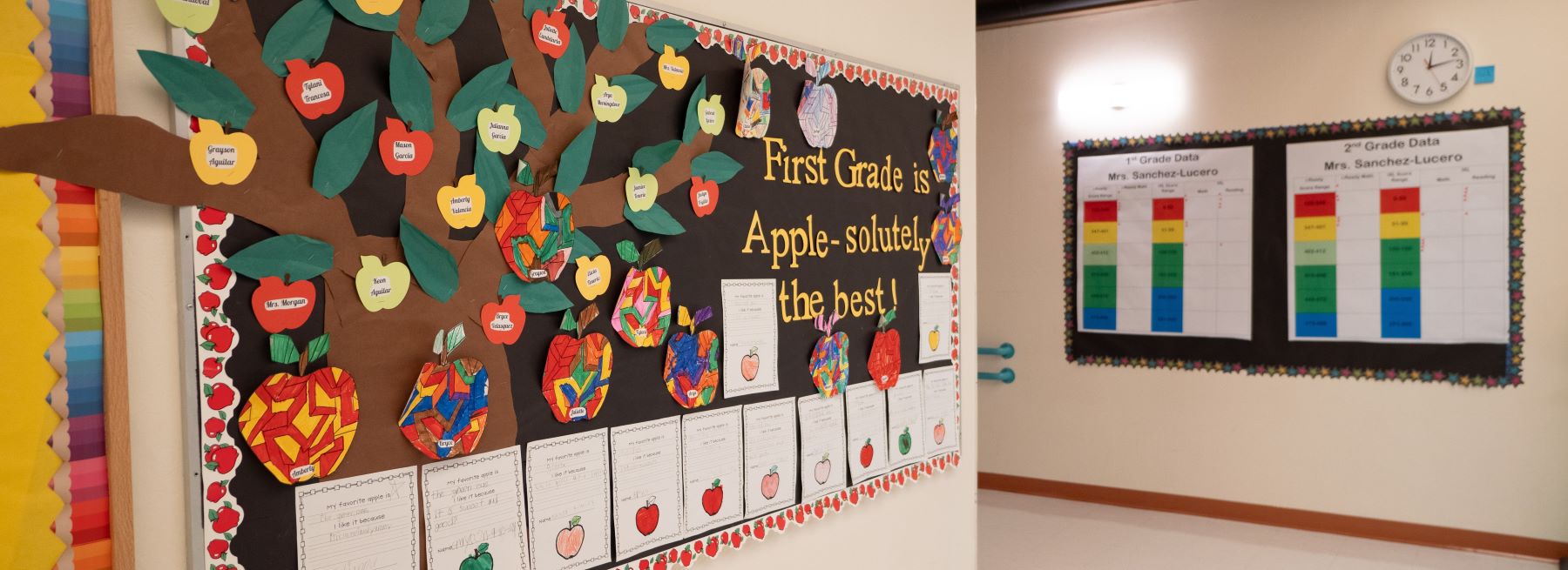 School hallway adorned with students projects on the bulletin boards.